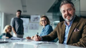 business meeting with smiling employees