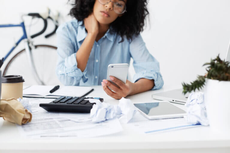 Woman doing her taxes and considering tax strategies for her estate plan