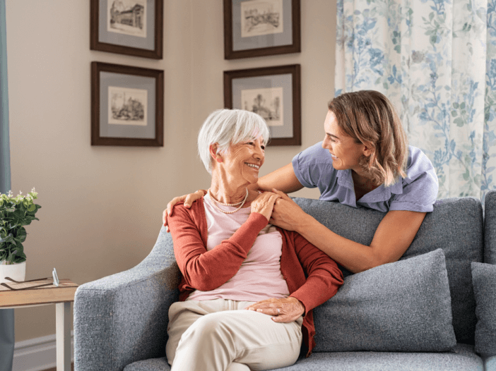 woman aging at home with caretaker