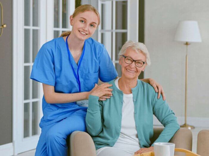 long-term care nurse with patient