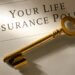 an image with a key on a document that says your life insurance policy