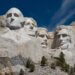 a picture of mt. rushmore showing all three presidents mentioned in the article that left their legacy behind for the rest of America.